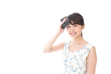 Fototapeta premium 猛暑・汗をかく女性