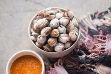 Boiled cockles with tasty sauce