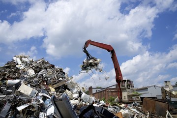 crane claw and magnet at recycling center, metal recycling 
