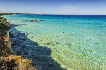 Summertime: fun sea. Protected oasis of the lakes Alimini: Turkish Bay. Just a few kilometers north of Otranto, this coast is one of the most important ecosystems in Salento and Apulia (Italy).