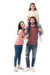 Fototapeta premium happy family with daughter looking at camera isolated on white