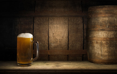 wooden board table in front of field of wheat on sunset light. Ready for product display montage