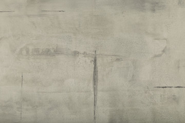 Raw or bare concrete wall, shot with panel seam lines perpendicular to image dimension