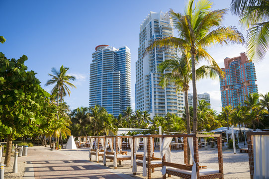 Bright scenic evening view of the South Beach skyline from the beachside boardwalk promenade 