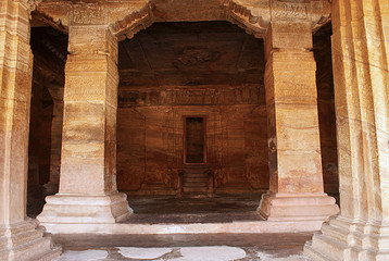 Cave 3 : The verandah itself. It is 7 feet, 2.1 m, wide and has four free-standing, carved pillars separating it from the hall. Badami Caves, Karnataka.