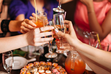 Celebration. People holding glasses of champagne making toast. New Year. Christmas. Birthday. Corporative.