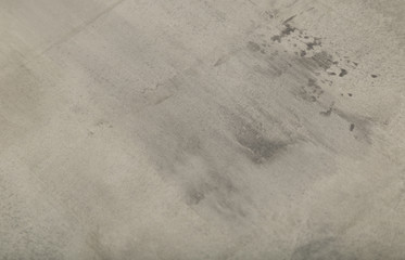 Raw or bare concrete wall, shot with panel seam lines perpendicular to image dimension