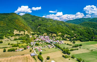 Rolgordijnen Aerial view of Coisia, a village in the Jura department of France © Leonid Andronov
