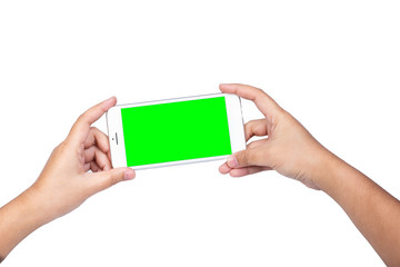 Hand holding a modern mobile smart phone with blank green screen isolated copy space on white background