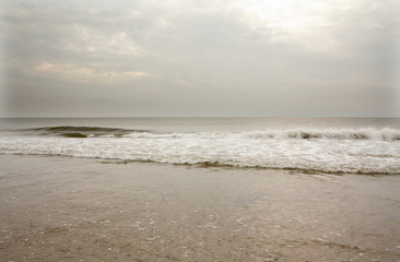 Fototapeta na wymiar North Sea beach in Denmark at cloudy day.