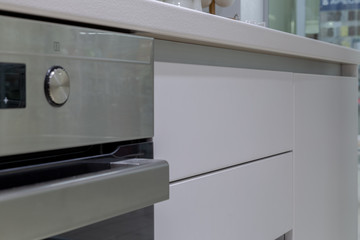 New design of built-in oven and cooker in the kitchen.