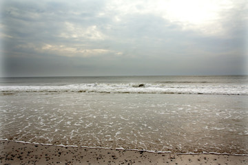 North Sea beach in Denmark at cloudy day.