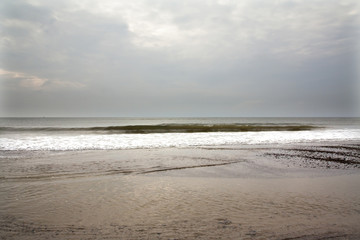 North Sea beach in Denmark at cloudy day.