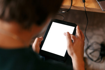 stylish man holding tablet with empty white screen and touching, sitting at meeting, business marketing lecture coaching