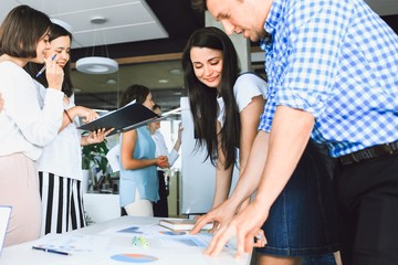 Business team in casual clothes at a meeting in a modern office