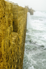The Sea Wall of the old city of Acre in a winter day