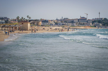 View from the shore of the Mediterranean Sea on Old Jaffa, Tel Aviv, Israel.