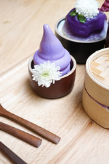 Obraz na płótnie Canvas Ice cream. A set of Japanese sweet potato dessert with soft focus on a soft serve ice cream in made from purple potatoes.