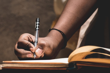 Boy writing a Book