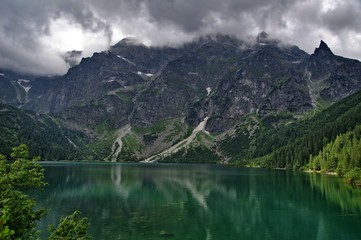 Morskie Oko lake in Polish Tatra mountains on cloudy day. 