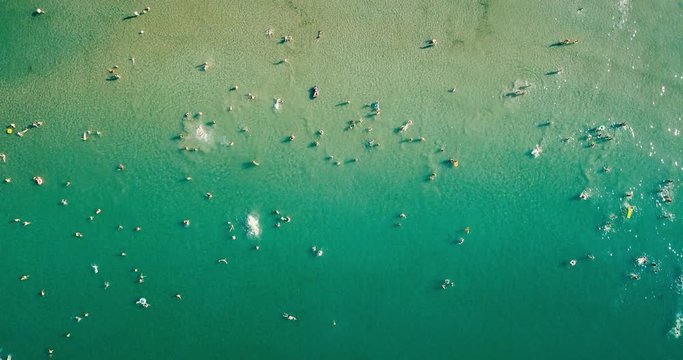 Aerial View From Flying Drone Of People Crowd Having Fun, Playing And Relaxing In Water At The Black Sea In Romania