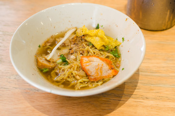 thai food, yellow noodlw with slice pork