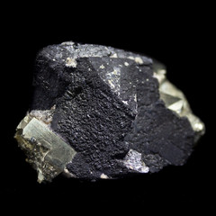 Natural pyrite natural cube cut on a black background
