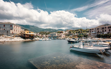 Fototapeta na wymiar Fishing boats in the harbour at Centuri in Corsica
