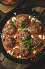 Meatballs in sweet and sour tomato sauce
