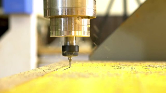 Milling of parts on a machine with numerical program control.