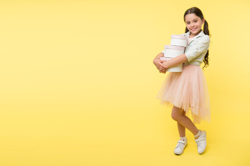 Girl carries pile boxes. Save money shopping sale season. Back to school season great time to teach budgeting basics children. Prepare for school season buy supplies stationery clothes in advance