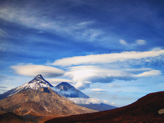volcanic landscape: view on Kamen Volcano, active Klyuchevskoy Volcano and active Bezymianny Volcano