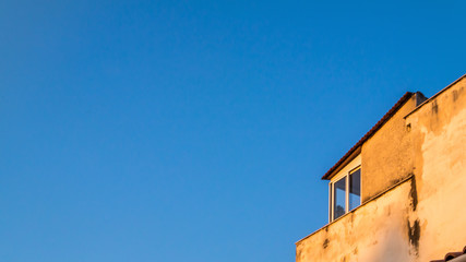 The Building Against The Blue Sky	