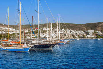 Obraz premium Bodrum, Turkey, 23 October 2010: Bodrum Cup Races, Gulet Wooden Sailboats with City View