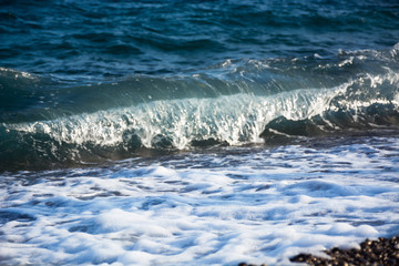 wave, sea foam on the shore