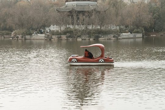 A family in a funny boat (Lotus Pond, Kunming, Yunnan, China)