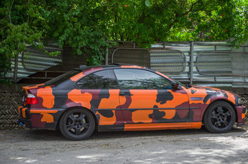 painted car in black and orange color