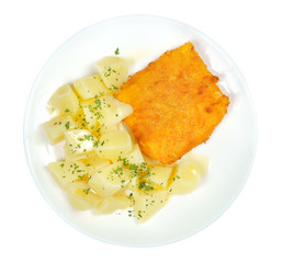 schnitzel with potatoes on white background