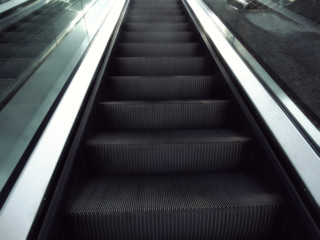 Escalator in modern interior airport