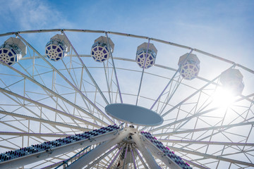 Mill wheel on a background of blue sky.