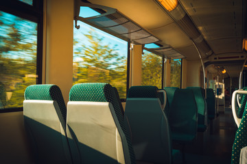 Fototapeta premium empty seats in a traveling train