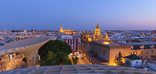 Seville, Spain. Panorama of the illuminated city after sunset, view from above
