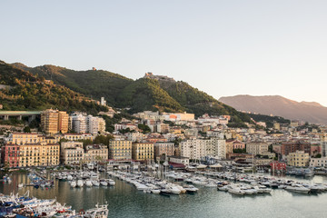 Fototapeta na wymiar View of the Salerno port at sunrise. Amalfi Coast. Region Campania, Italy