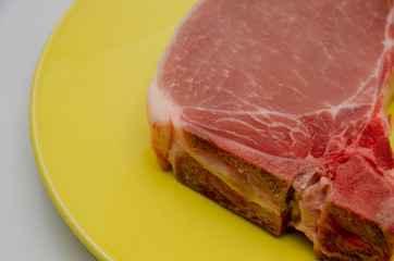 meat lies on a plate, appetizing meat for cooking