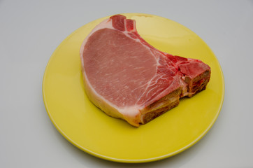 meat lies on a plate, appetizing meat for cooking