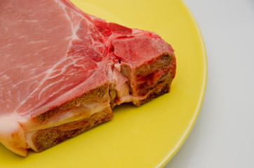 meat lies on a plate, appetizing meat for cooking