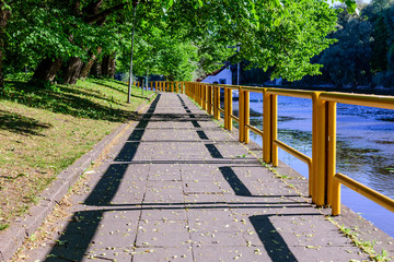 Emajogi river. Park and footpath, Tartu, Estonia.