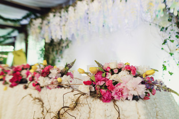 Wedding ceremony. Original wedding floral decoration .