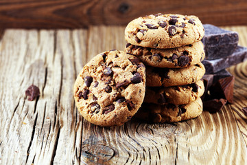 Chocolate cookies on table. Chocolate chip cookies shot with chocolate