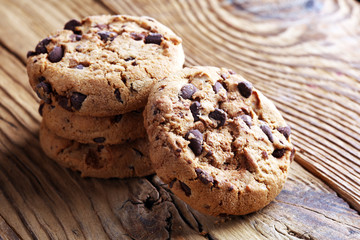 Chocolate cookies on table. Chocolate chip cookies shot with chocolate